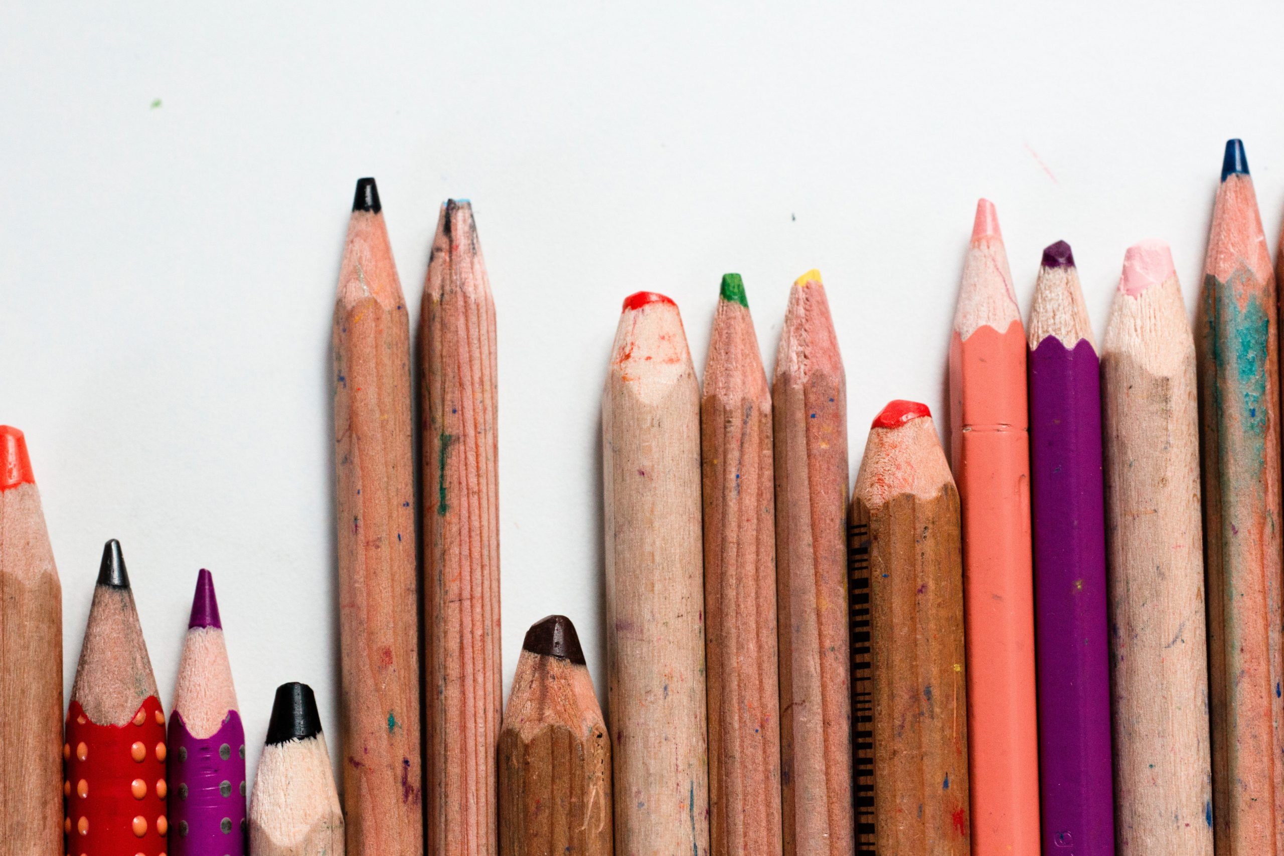 Various sharpened and dulled colored pencils.